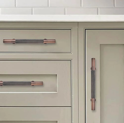 10 Pack 3 Inch Knurled Brushed Antique Copper Cabinet Drawer Pulls installed on white kitchen cabinets