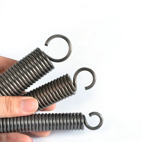 Pack Of 2 Heavy Duty Dual Hook Tension Springs In Gray And Black Featuring 3Mm Wire With 18-20Mm Outer Diameter and Variable Lengths from 60 to 500 Mm for Tough Projects and Electronics Repairs held by hand.