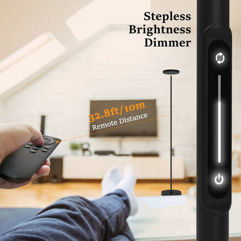 Person using remote for LED Torchiere Floor Lamp With Remote And Touch Control Dimmable Modern Standing Light In Black.