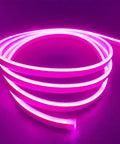 Pink 12V Waterproof LED Silicone Neon Light Strip Rope Light 16.4 Ft 5m Cuttable glowing, flexible loop on dark background