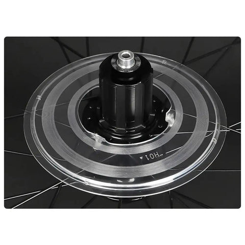 Rear wheel with transparent ABS bike spoke protector, part of a Three Pack Bike Spoke Protector Guard Set For Rear Wheel Made From Lightweight ABS Plastic Keeps Your Chain From Snagging Spokes On Mountain And Road Bikes Durable Cycling Accessory.