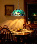 Tiffany Style Stained Glass Pendant Light With 16 Inch Wide Shade, 67 Inch Tall Vintage Vibe Hanging Lamp over dining table.
