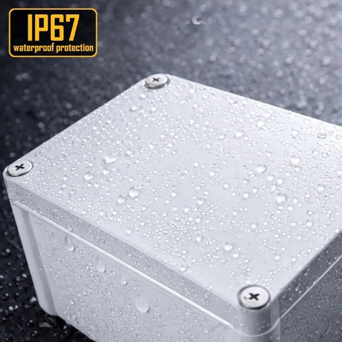 Rock Solid Electrical Junction Box With IP67 Waterproof Rating, Heavy duty plastic enclosure with water droplets.