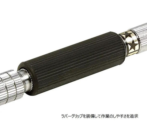 Close-up of Fine Pin Vise Drill for Model Making with rotating elastomer grip and brass body detail, 0.1 to 3.2 mm hole size.