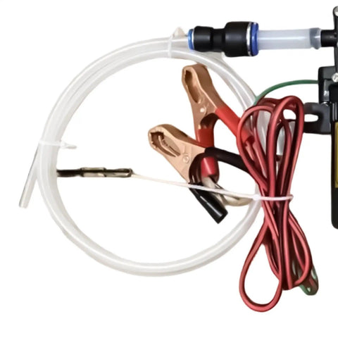 Heavy Duty 12V Self Priming Transfer Oil Pump For Garage And Shop Fluid Extractor hoses and battery clips for fluid transfer.