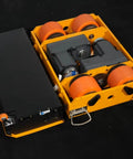 Heavy Duty Battery Powered Machinery Transport Dolly With Wireless Remote Control That Picks Up Massive Loads In Beast Mode showing top view of internal components and wheels.