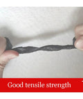Heavy Duty Torch On Asphalt Roof Sealant Roll displaying good tensile strength while being twisted for roof patch jobs.