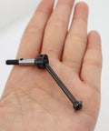 Two Pack 40MM Steel CVD Drive Shafts For One Tenth Scale RC Drifting Cars Beefed Up Heavy Duty Upgrade in hand close-up