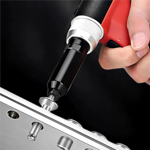 Close-up of Heavy Duty Air Rivet Gun Kit For Auto Construction And Metalwork with 20mm stroke and 2800 kg force riveting a metal surface.