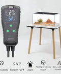 2 In 1 All In One Temperature And Humidity Controller Outlet Plug In Thermostat Humidistat next to reptile terrarium on table