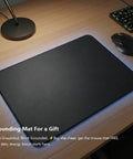 Desk with Grounding Mouse Pad from Grounding Fitted Sheets With 25 Percent Silver Infused Fiber And Cotton wellness kit.