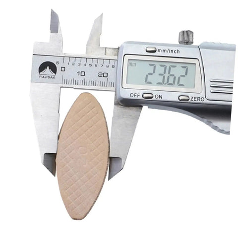 Caliper measuring beech wood biscuit from 100 Pcs Beech Wood Biscuits Set For Woodworking, Easy Biscuit Joinery For Strong Furniture Framing