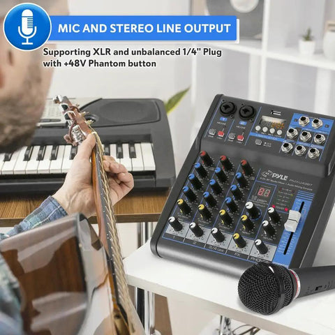 4 Channel DJ Mixer With Bluetooth And USB MP3 Playback, Built-In Phantom Power, next to a microphone and keyboard