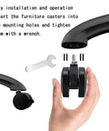 Heavy Duty Replacement Office Chair Wheels With Roll Like Butter Polyurethane Tires, Universal 2 Inch 10 Mm Stem Casters being installed with a wrench.
