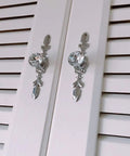Crystal Glass Decorative Knobs With Plate Drawer Pulls Handles 5 Pack Small Silver With Three Kinds Of Screws For Kitchen Bathroom Office Decoration Diamond Shine Bling Sparkle installed on white louvered cabinet doors.