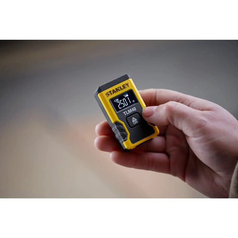 Laser Pocket Measure 12 m Handheld Distance Tool For Pros, Contractors, And DIYers, Compact And Durable Laser Measurer With Quick Readouts, Accurate Measurements, Ideal For Carpentry, Interior Design, And Renovations Model STHT77666-0 in hand