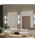 Zura Bath and Vanity Light in Chrome shown in bathroom setting with opal glass, Model P300062-015