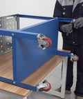 Person assembling rust free welding table 36 by 18 inches beefed up universal work cart with five eighth inch hole pattern.