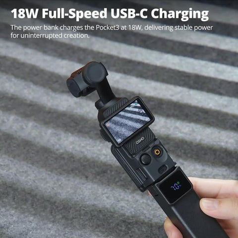 Power Bank Grip For Pocket 3 And Pocket 4 Camera With 5000 mAh Battery LED Display showing 18 Watt USB C Charging