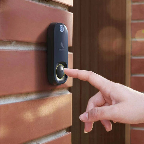Hand pressing Photo Doorbell With Indoor Chime, Get Still Image Snaps When Motion Or Doorbell Is Detected, installed on brick wall