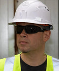 Worker wearing Pro Grade Safety Glasses Kit With Full Frame Lenses And Breakaway Lanyard Eight Piece Set For Extra Coverage And Superior Impact Protection ANSI Z87.1 Plus CSA Z94.3 Certified Eye Gear For Work Sites Gray Lenses