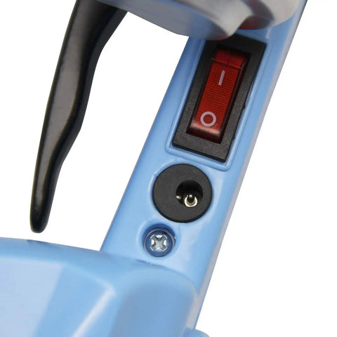 Detail of the No Hassle Electric Strapping Machine's control switch and charging port for efficient operation.