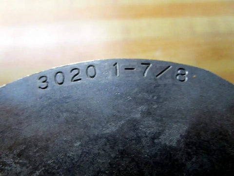 Close-up of Dodge Taper-Lock Bushing 117116 1-7/8 Bore With 1/2 Inch Keyway engraving on metal surface