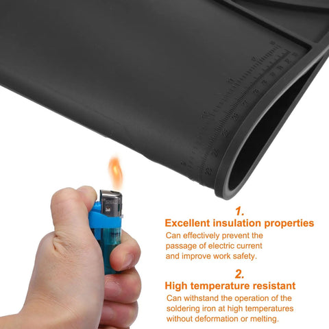 Badass Magnetic Silicone Soldering Mat Work Station Repair Pad Heat Resistant To 500 Celsius Non Slip Folding Surface 21.7 By 15 Inches Black features ruler and a lighter demonstrating heat resistance.