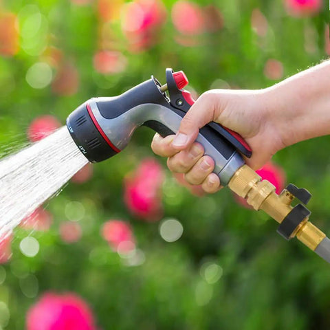 Heavy Duty Brass Garden Hose Shut Off Valve Set With 2 Valves And 4 Extra Washers Solid Brass One Way Connector in use spraying water