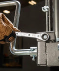 Hand using Ratcheting Box Wrench Set SAE One Quarter Inch To Three Fourth Inch Five Piece Kit for tightening a bolt