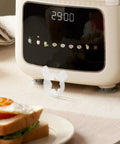 Six Point Star Ice Cream Nozzle Replacement For Soft Serve Machines with hexagon shaping tip beside a kitchen timer display.