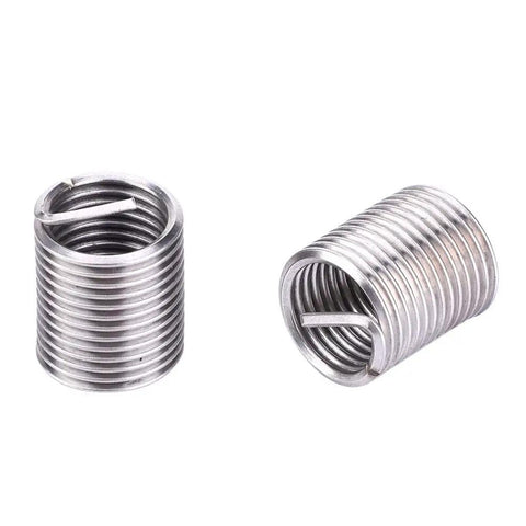 Close-up of stainless steel thread inserts from 17 Piece M12x1.5 Thread Repair Kit With Spiral Drill, Screw Tap, Wrench, Break Pin Tool And Hex Keys, Includes 12 Stainless Steel Thread Inserts For Damaged Hole Repair Heavy Duty DIY And Auto Repair Ready.