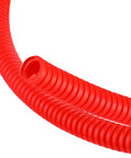 Quarter Inch Split Wire Loom Tubing Provides Straight Up Tough Cable Conduit Protection That Shuts Down Pet Chewing Threats While Keeping Your Electric Wire Cord Arrangement Crisp And Zero Hassle In Bold Red, shown coiled.