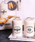 Heavy Duty Metal Coffee Canister Set Of Three Wide Mouth Kitchen Storage Jars For Beans Tea Sugar And Nuts with labels.