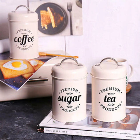 Heavy Duty Metal Coffee Canister Set Of Three Wide Mouth Kitchen Storage Jars For Beans Tea Sugar And Nuts with labels.