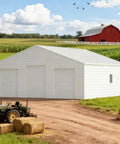 Heavy Duty Steel Barn Garage With Roll Top Metal Doors For Trucks Tractors Rvs Atvs And Workhorses Storage Shelter in a rural setting