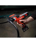 Heavy Duty Cordless Ratcheting Cable Cutter Kit Packs Serious Punch To Easily Rip Through 600 MCM Copper And 750 MCM Aluminum With Low Profile Jaws Built For Cramped Electrical Panels, held in hand.