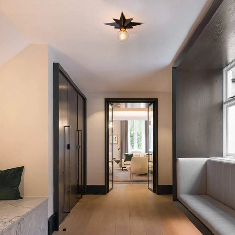 Black Star Flush Mount Ceiling Light With Dope Mid Century Vibe, Modern Ceiling Fixture illuminating a stylish hallway