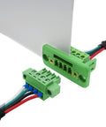 Five Pack 4 Pin Screw Terminal Block Connector With Through Wall Mount 3.81 Millimeter Pitch Beefy PA66 Flame Retardant Safe And Reliable 8 Amp At 300 Volt Fits 16 To 28 AWG Wires installed on a panel