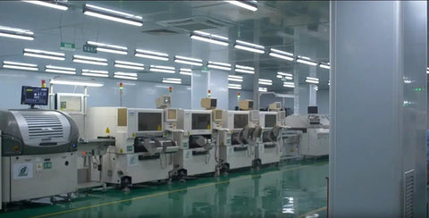 Industrial automation facility with machines using Double Rod Pneumatic Cylinder With 40mm Bore And 75mm Stroke