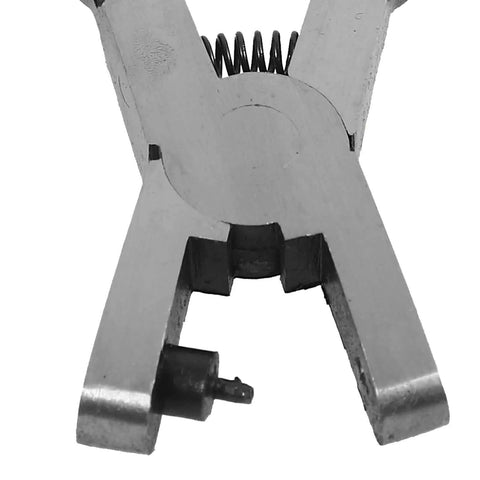 Close-up of handheld single hole puncher plier for office and craft projects, showing durable steel build and punching mechanism