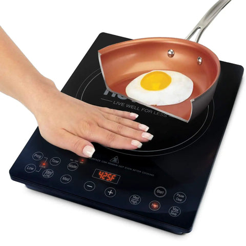 Pro Chef Induction Cooktop Portable 1800W With 8 Inch Heating Coil NSF-Certified showing hand and pan with egg on ceramic surface