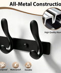 Close-up of Badass Heavy Duty Wall Hooks Slick Black Metal Coat Hanger And Towel Rack with all-metal construction.