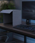 Dang Clean Kickass Desktop Soundproof Mic Booth With Dense Acoustic Foam Panels for Podcast Recording on a desk.