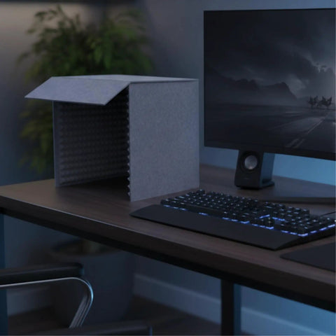 Dang Clean Kickass Desktop Soundproof Mic Booth With Dense Acoustic Foam Panels for Podcast Recording on a desk.