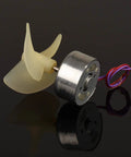 DC motor with plastic propeller, silver casing, wires. Part of 6 Pack DC 3V 1730RPM Mini Electric Motors For DIY Toys And Wind Turbine Generators Perfect For STEM Projects Tiny 25mm Motors With 9x2mm Shafts Great Power For Micro Machines And Robotics
