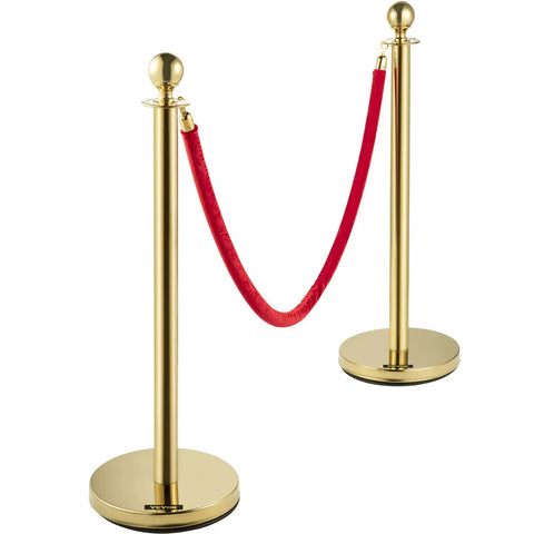 Gold Stanchions With Velvet Ropes Set Of 4, Solid Concrete Base And Stainless Steel Posts, 5ft Red Velvet Ropes For Crowd Control, Red Carpet Event Barriers, VIP Entry Decor For Parties And Events, featuring two gold posts and a red rope.