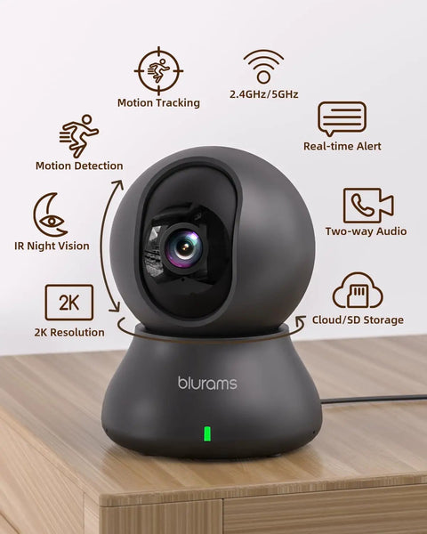 2K Indoor Camera With 360 Degree Coverage showing features like motion tracking, night vision, and phone app control on a wooden table.
