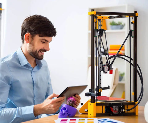 Man using tablet near 3D printer with Ten Pack 48 Inch T Slot Aluminum Extrusion Linear Rail System 2020 installed