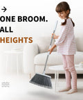 Child holding Adjustable 55 Inch Outdoor Broom For Pet Hair Removal And Heavy Duty Floor Cleaning Indoors And Outdoors